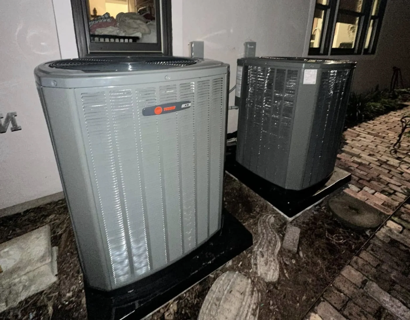 Air conditioning condenser unit outside a Houston home