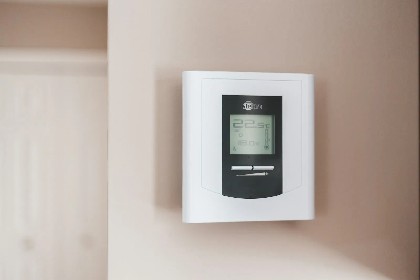 Wall thermostat showing the set temperature