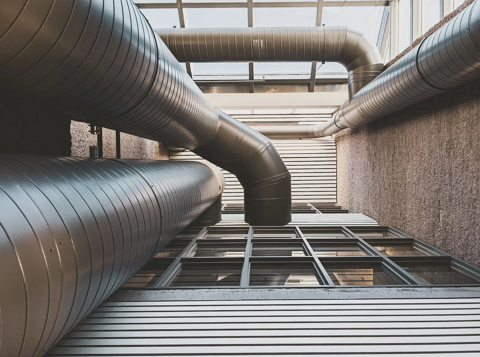 Sheet metal HVAC ductwork running through a building