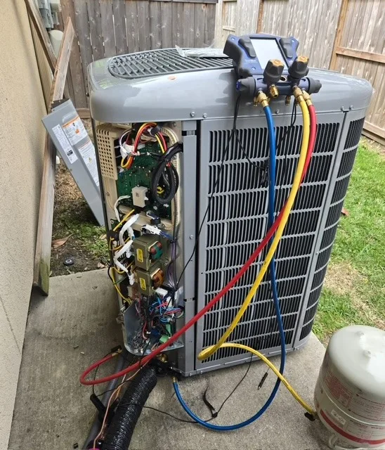 Outdoor heat pump unit installed at a Texas home